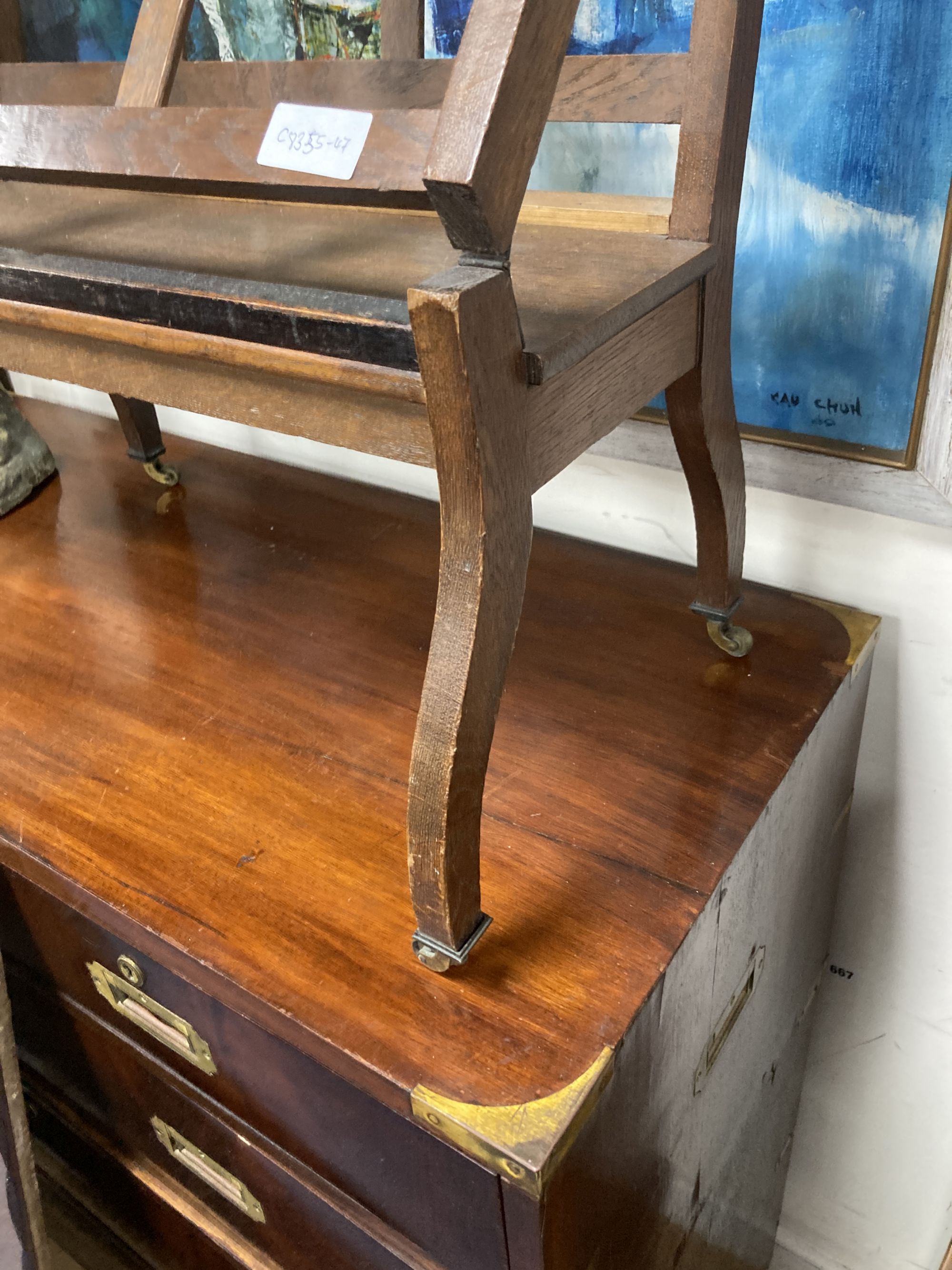 An oak folio stand, width 60cm, depth 24cm, height 76cm